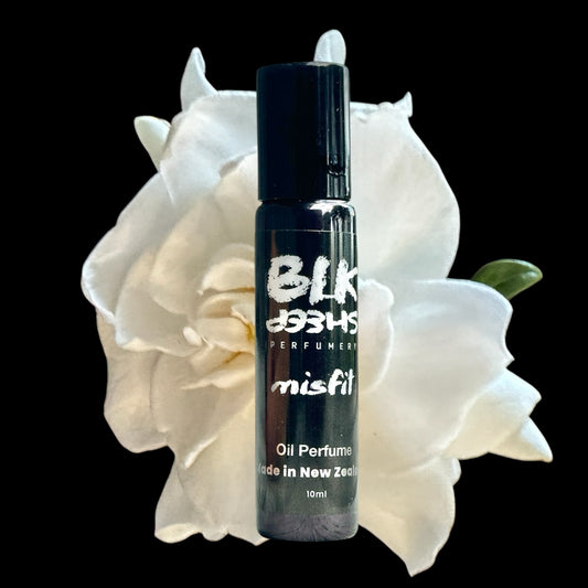 Misfit, twisted gardenia floral oil perfume. Sweet and romantic scent made from organic CCT oil with niche fragrance NZ. Alcohol Free perfume in a rollerball. By BLK Sheep Perfumery